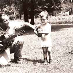 Now this is really 'EARLY"! That's me and my dad when I was about three. See where I got my musical roots?